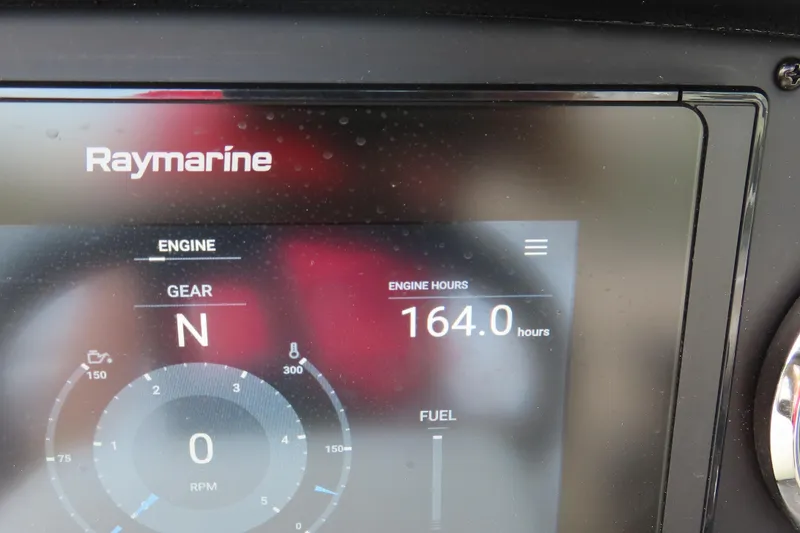 Slide: The Image of Raymarine display showing 164 engine hours on 2019 C 285ss model. - 22