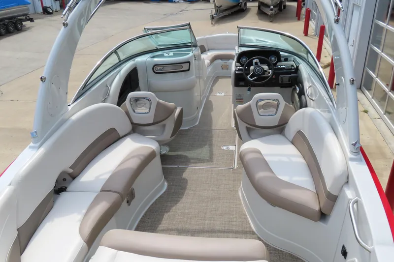 Slide: The Image of 2019 C 285ss boat interior with plush seating and modern dashboard. - 8