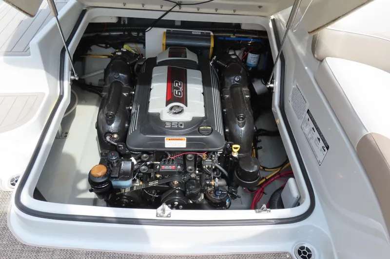 Slide: The Image of Engine compartment of a 2019 C 285ss boat, featuring a 6.2L 350 horsepower engine. - 9