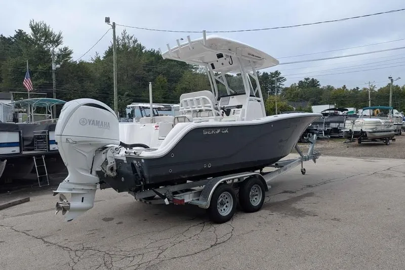 Slide: The Image of 2024 Sea Fox 228 Commander boat on trailer with Yamaha outboard motor. - 2