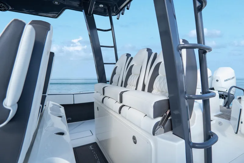 Slide: The Image of 2026 World Cat 400CC-X boat interior with luxurious seating and ocean view. - 16