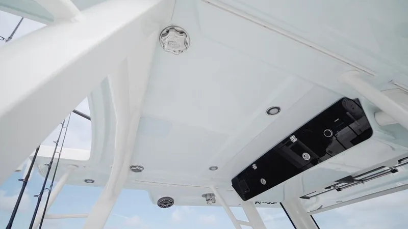 Slide: The Image of 2026 World Cat 400CC-X boat interior ceiling with modern fixtures and sleek design. - 41