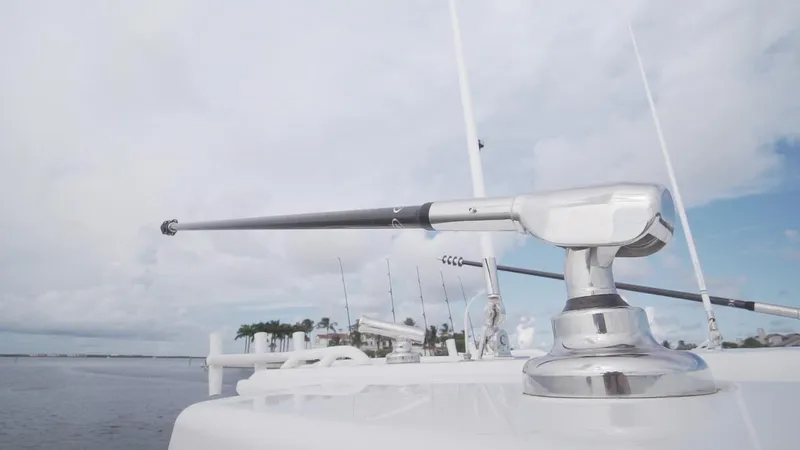 Slide: The Image of 2026 World Cat 400CC-X boat detail with sleek chrome fittings and ocean backdrop. - 42