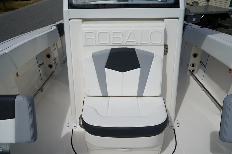 Slide: The Image of 2026 Robalo R250 Center Console boat seat with stylish design and branding. - 36