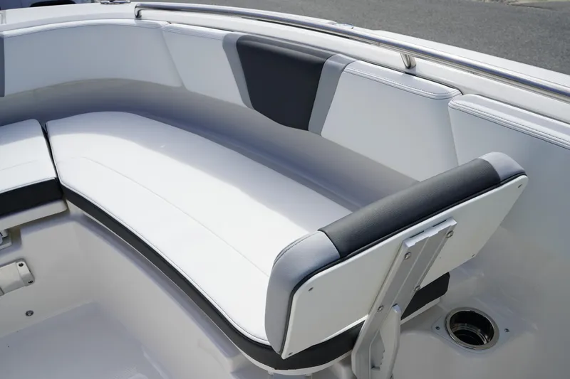 Slide: The Image of 2026 Robalo R250 Center Console boat interior with cushioned seating. - 41