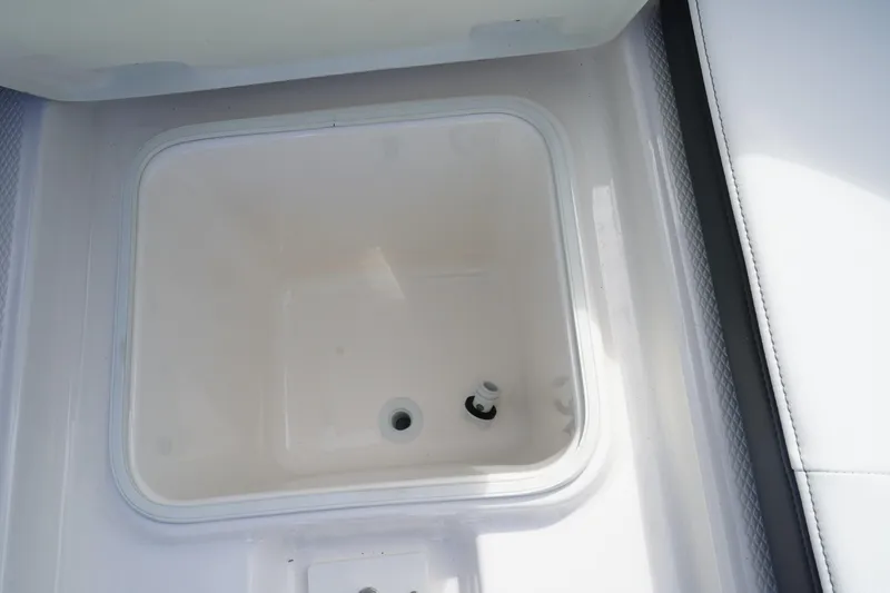 Slide: The Image of Livewell compartment on 2026 Robalo R250 Center Console boat. - 47