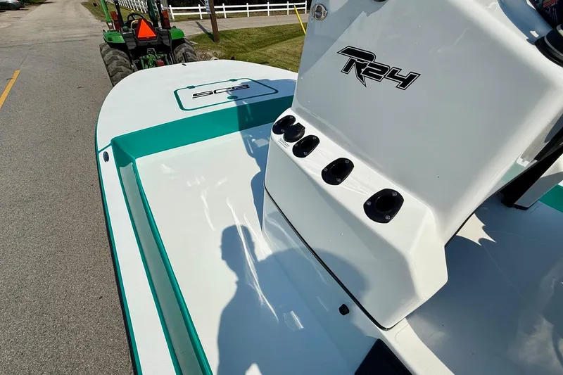 Slide: The Image of 2026 SCB R24 boat on road, featuring sleek design and modern detailing. - 12