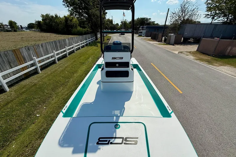 Slide: The Image of 2026 SCB R24 boat on road, showcasing sleek design and vibrant accents. - 15