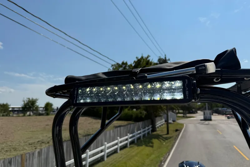 Slide: The Image of 2026 SCB R24 boat with mounted LED light bar on a sunny day. - 20