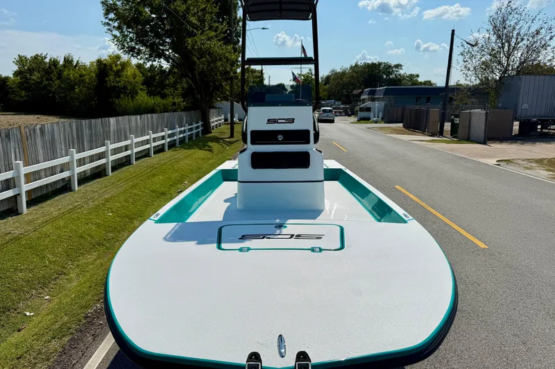 Slide: The Image of 2026 SCB R24 boat on a road, showcasing sleek design and modern features. - 6