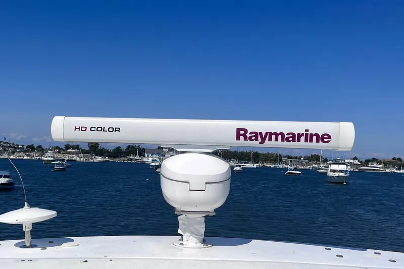 Slide: The Image of Raymarine HD Color radar on 2007 Cruisers Yachts 370 Express, with boats in the background. - 32
