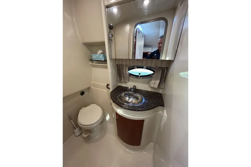 Slide: The Image of 2008 Formula 34 Performance Cruiser interior with beige leather seating and wooden accents. - 27