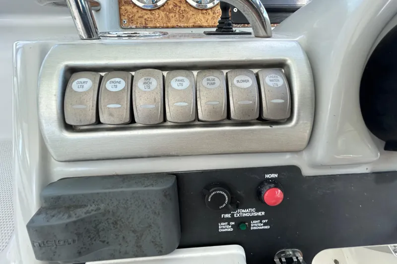 Slide: The Image of 2008 Formula 34 Performance Cruiser dashboard with Raymarine navigation and gauges. - 64