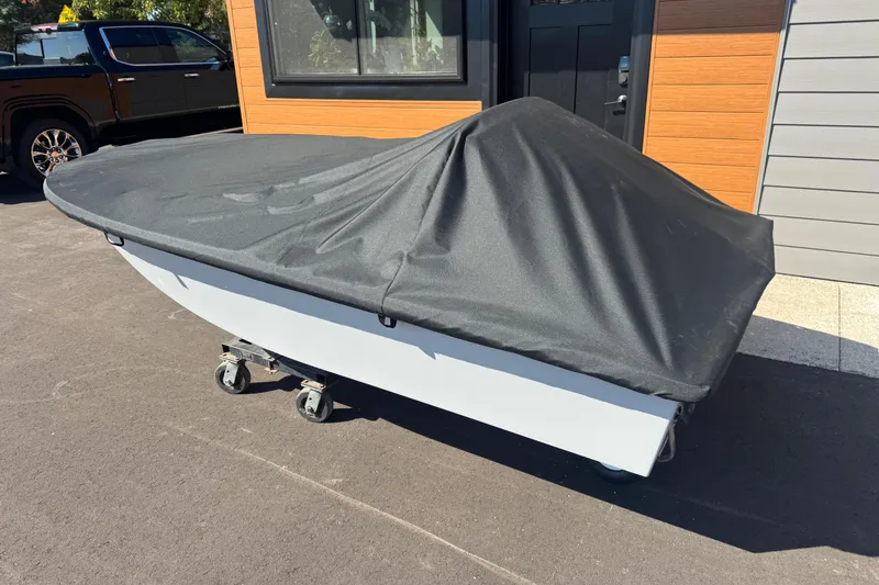 Slide: The Image of Covered Go-Float Vortex 2025 model on wheels, parked outside a modern building. - 5