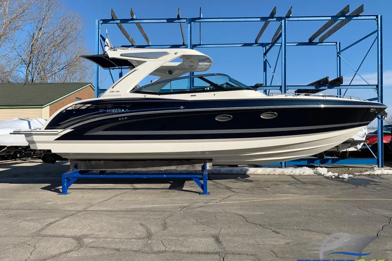 The Image of 2020 Formula 330 Crossover Bowrider boat on display, side view. - 0