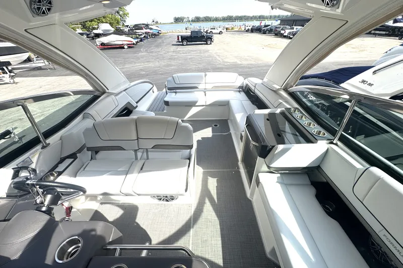 Slide: The Image of 2020 Formula 330 Crossover Bowrider interior with spacious seating and modern design. - 23