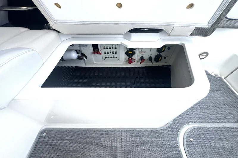 Slide: The Image of 2020 Formula 330 Crossover Bowrider interior with sleek seating and built-in cup holders. - 27