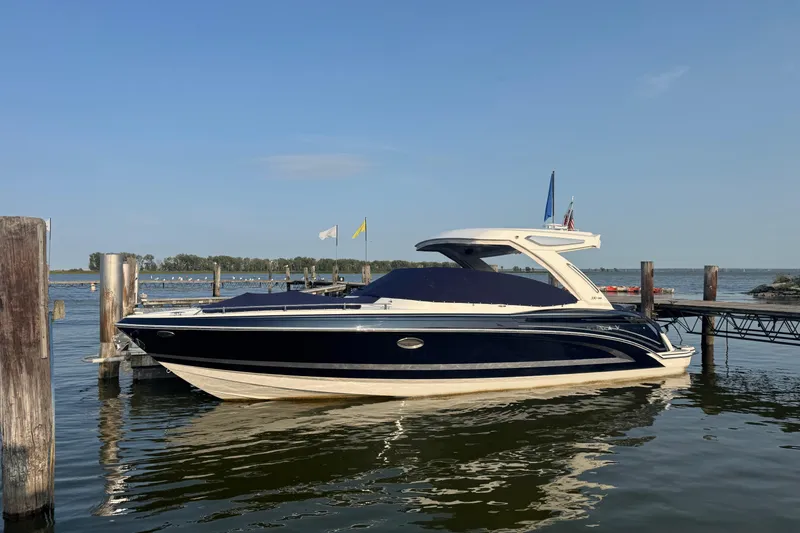 Slide: The Image of 2020 Formula 330 Crossover Bowrider docked on a sunny day. - 36