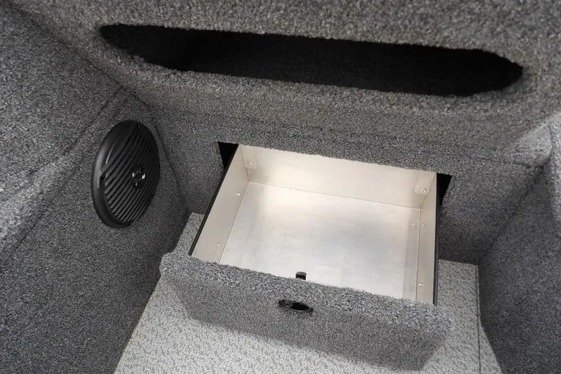 Slide: The Image of 2022 Lund 1875 Impact Sport storage compartment with speaker, gray interior. - 23