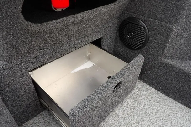 Slide: The Image of Open storage compartment in 2022 Lund 1875 Impact Sport boat interior. - 26