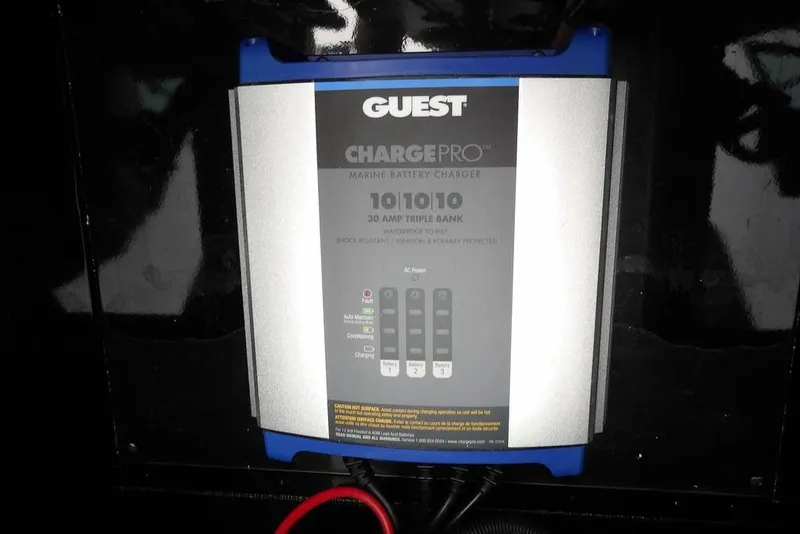 Slide: The Image of Marine battery charger in a 2022 Lund 1875 Impact Sport boat. - 34