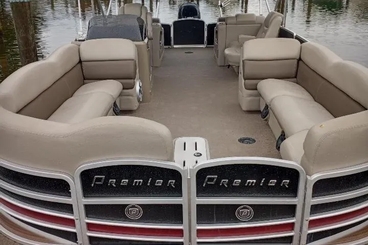 Slide: The Image of 2013 Premier 290 Grand Isle pontoon boat with spacious seating and elegant design. - 3