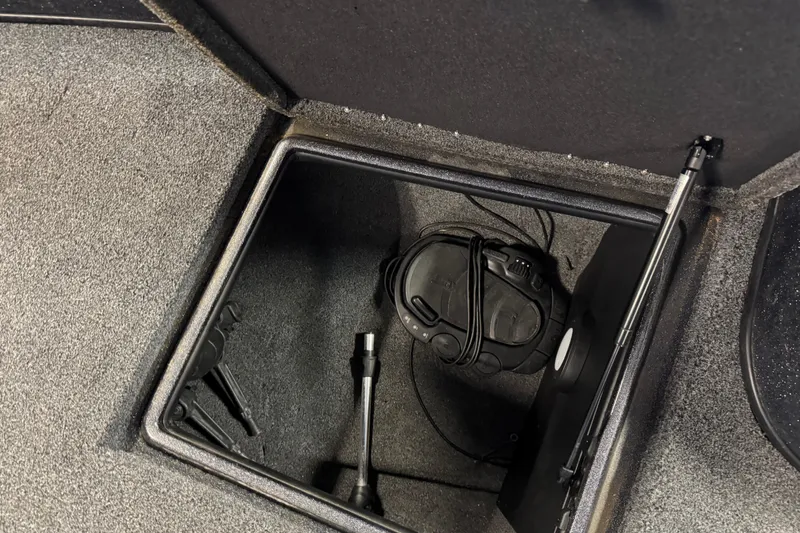 Slide: The Image of Storage compartment in 2022 Nitro ZV21 Pro boat with tools and equipment. - 18