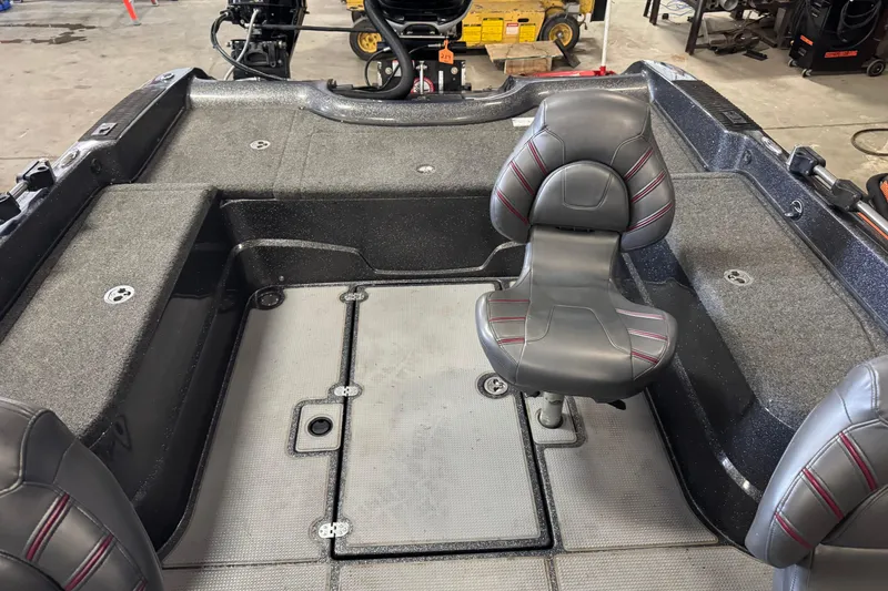 Slide: The Image of Interior of a 2022 Nitro ZV21 Pro boat with seating and storage compartments. - 6