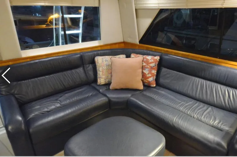 Slide: The Image of Luxurious leather seating in 2000 Riviera 48 Enclosed Flybridge yacht interior. - 10