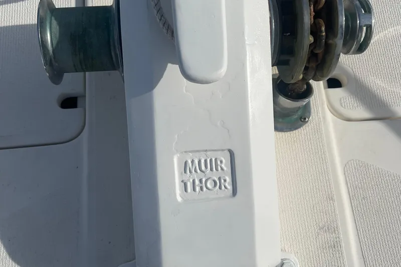 Slide: The Image of Muir Thor windlass on 2000 Riviera 48 Enclosed Flybridge yacht deck. - 25