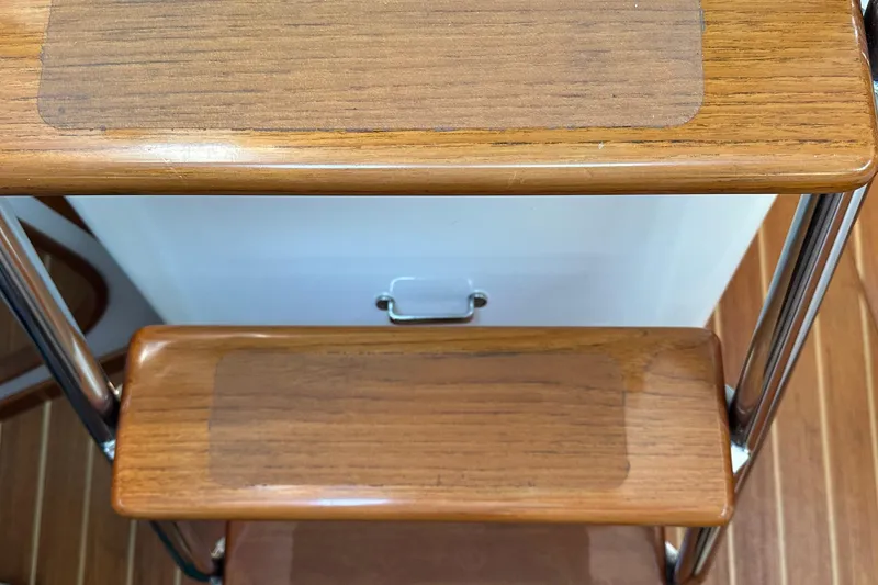 Slide: The Image of Wooden steps with metal rails on a 2000 J Boats J/120 sailboat. - 18