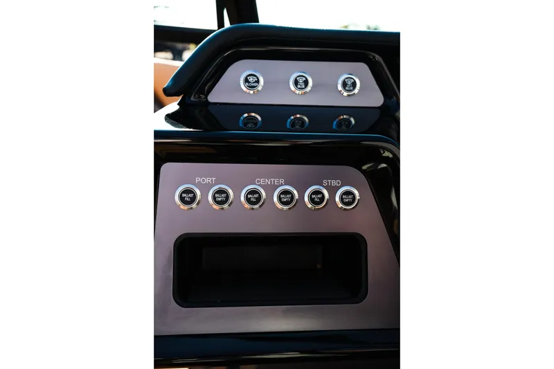 Slide: The Image of Control panel of 2026 MasterCraft NXT24 boat with ballast fill and empty buttons. - 28