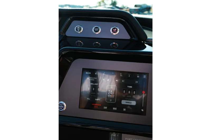 Slide: The Image of 2026 MasterCraft NXT24 dashboard with touchscreen controls and ballast settings. - 29