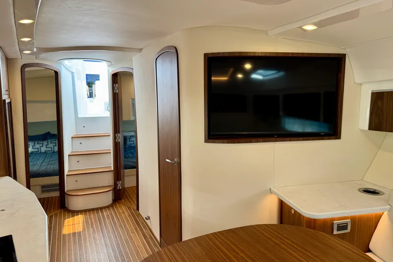 Slide: The Image of Luxurious interior of 2026 Intrepid 50 Evolution yacht with modern amenities and elegant design. - 14