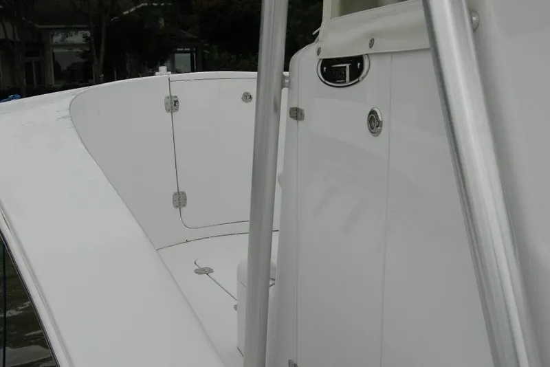 Slide: The Image of 2013 Composite Yacht 26, sleek white deck and cabin details, showcasing modern design. - 15