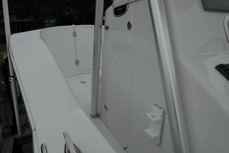 Slide: The Image of 2013 Composite Yacht 26, sleek white deck and railing detail. - 20
