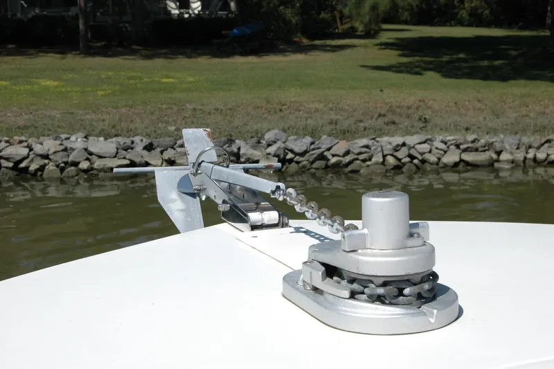 Slide: The Image of Anchor mechanism on 2013 Composite Yacht 26, near rocky shoreline. - 22