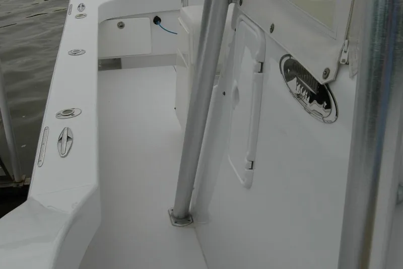 Slide: The Image of 2013 Composite Yacht 26 deck view with sleek design and stainless steel fittings. - 32