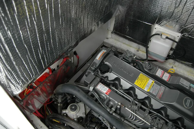 Slide: The Image of Engine compartment of 2013 Composite Yacht 26, showcasing detailed mechanical components. - 37