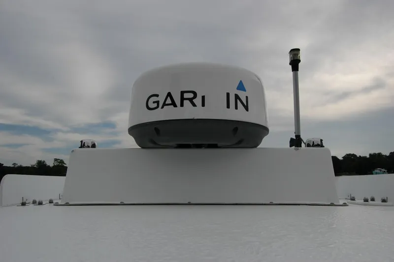 Slide: The Image of Garmin radar on 2013 Composite Yacht 26 under cloudy sky. - 64