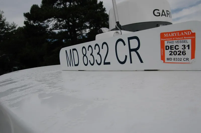 Slide: The Image of Maryland registered Composite Yacht 26, 2013 model, with license MD 8332 CR, valid until 2026. - 66