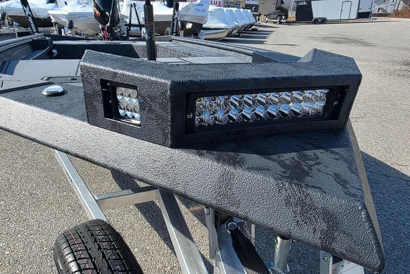 Slide: The Image of 2026 Xpress X18DB boat with LED light bar on trailer. - 4