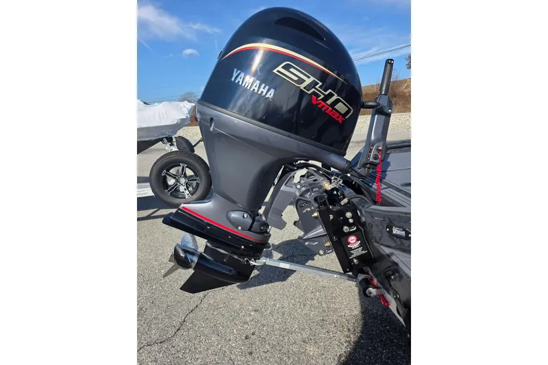 Slide: The Image of 2026 Xpress X18DB boat with Yamaha VMAX outboard motor on a trailer. - 7