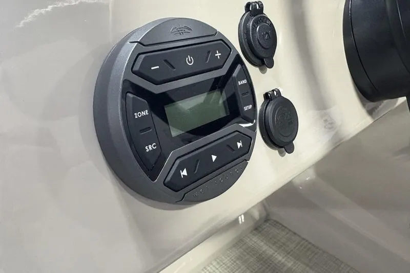 Slide: The Image of Control panel of 2026 Premier 220 Sunscape RF boat with buttons and display. - 16