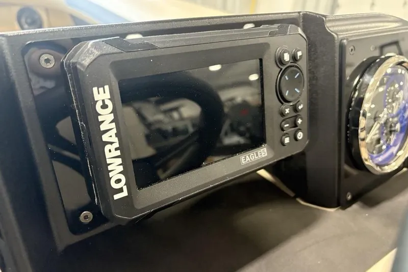 Slide: The Image of Lowrance display on 2026 Premier 220 Sunscape RF boat dashboard. - 17