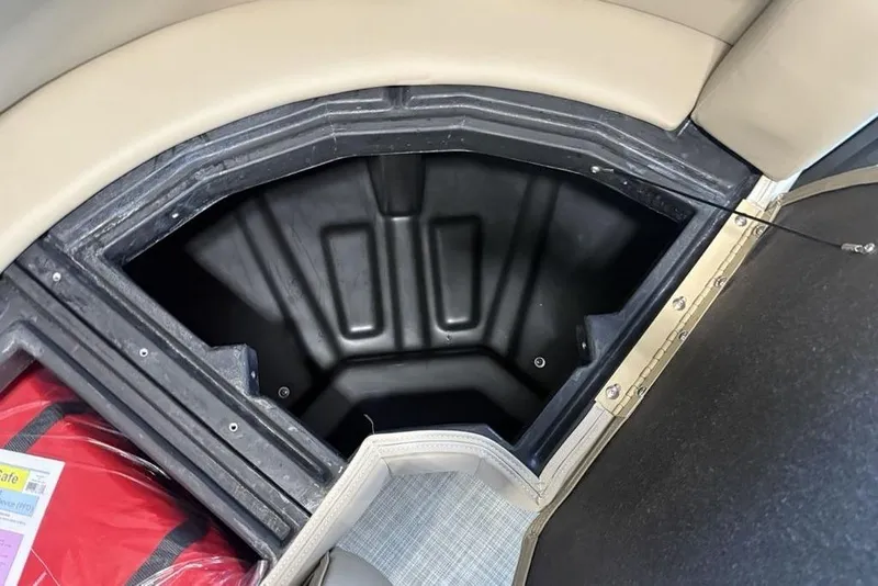 Slide: The Image of Storage compartment in 2026 Premier 220 Sunscape RF boat, featuring spacious interior and secure design. - 9