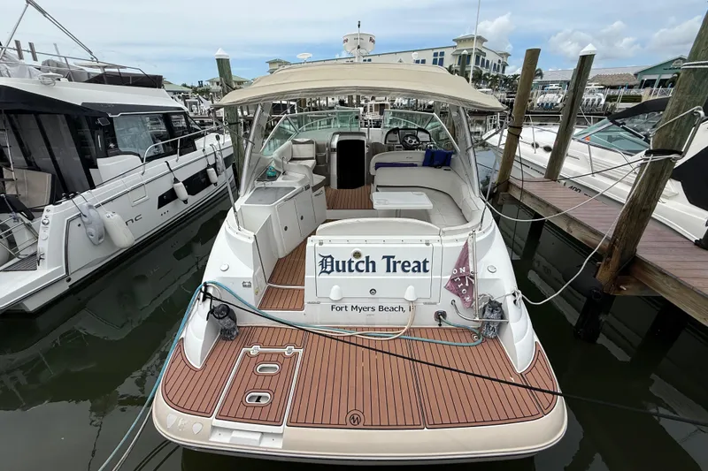 Slide: The Image of 2008 Cruisers Yachts 330 Express docked at marina, Fort Myers Beach. - 2