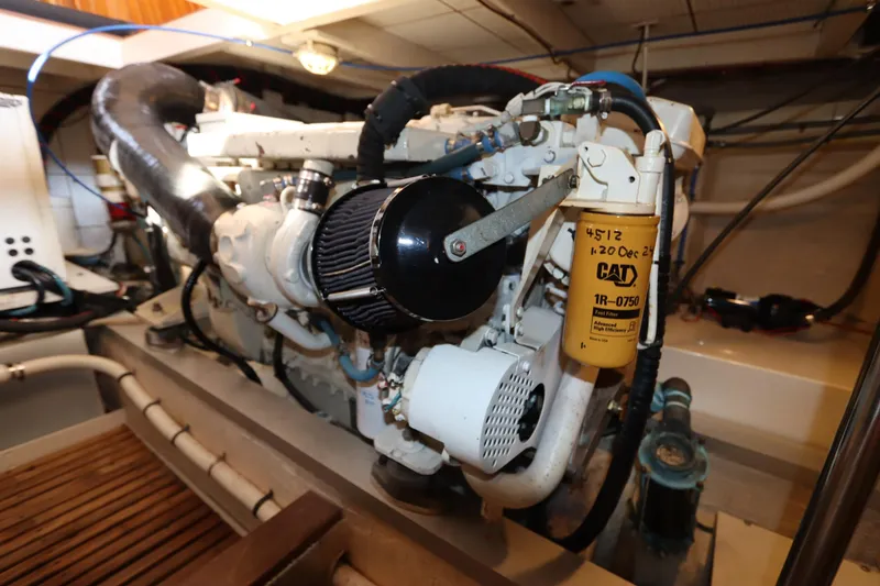 Slide: The Image of Engine room of 1993 Grand Banks 46 Classic yacht with CAT fuel filter. - 110