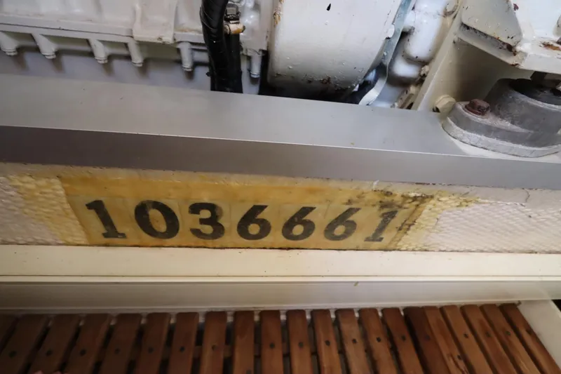 Slide: The Image of Engine room detail of 1993 Grand Banks 46 Classic, showing serial number 1036661. - 118