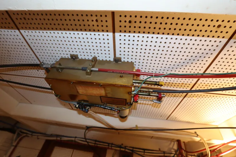 Slide: The Image of Electrical wiring and components on a 1993 Grand Banks 46 Classic yacht ceiling. - 119